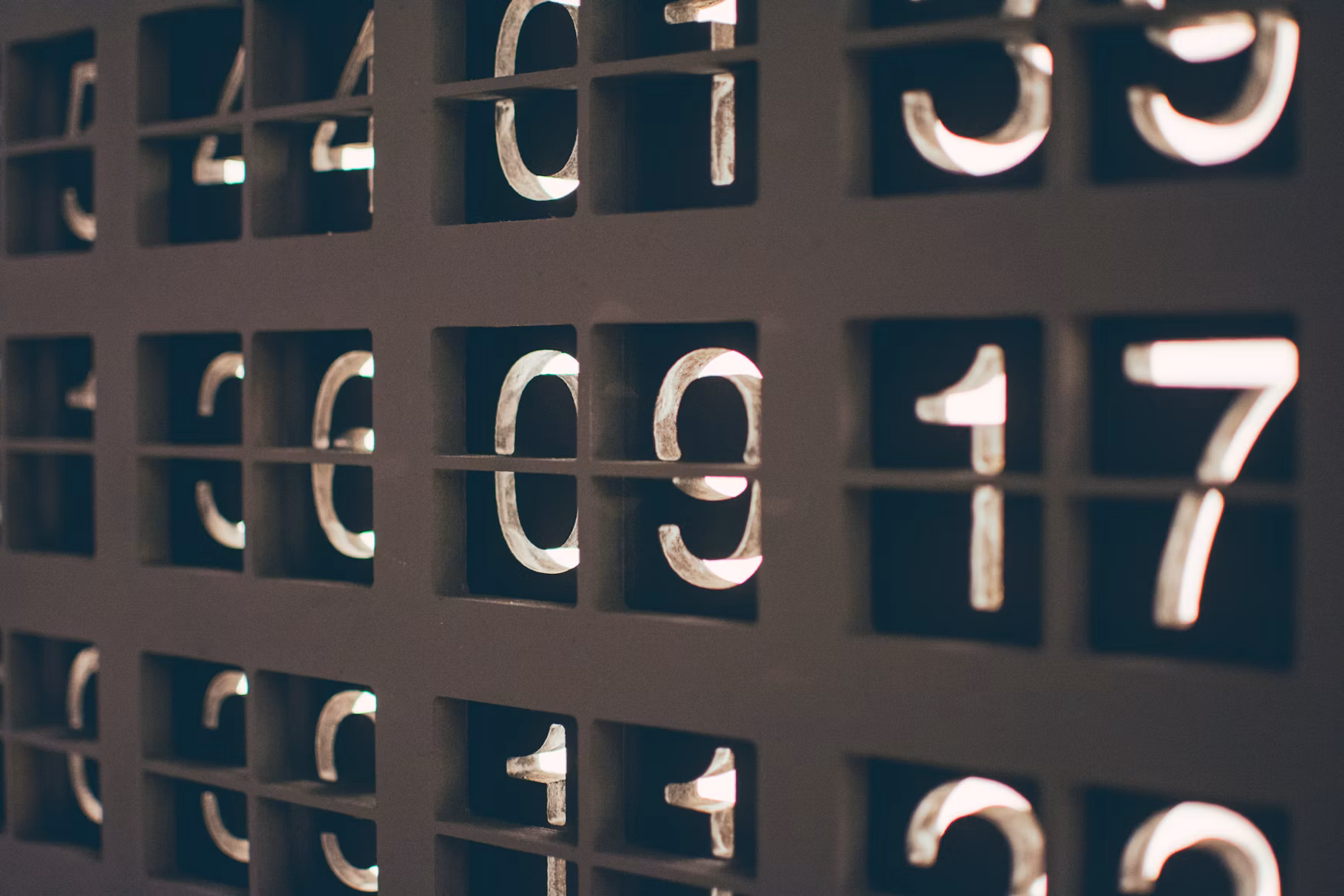 Mechanical flip clock with numbered panels.
